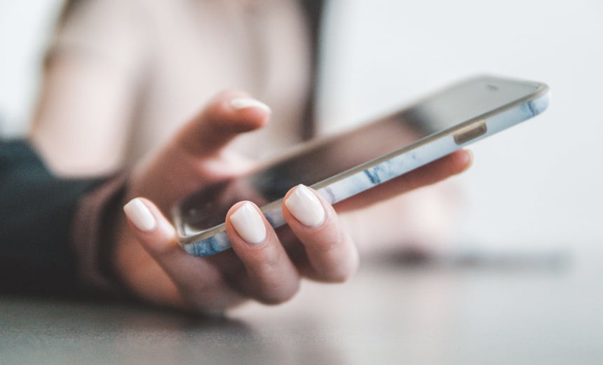 closeup of person holding a phone