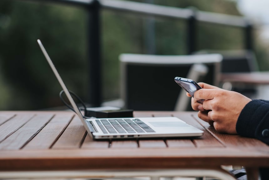 person looking at text message on phone